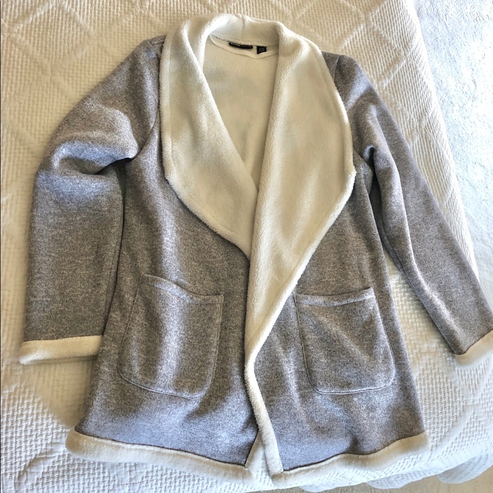 Lilac sweater jacket with white faux fur lining